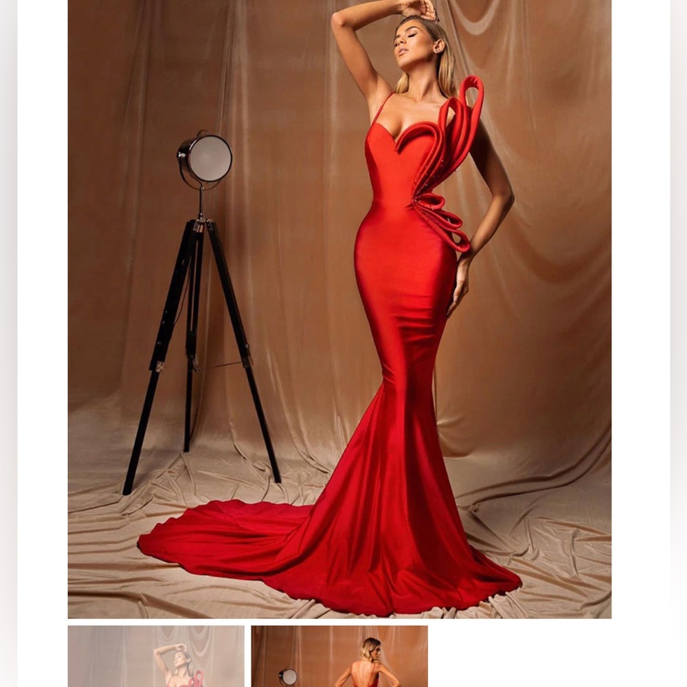Stunning red dress. Worn once for my wedding reception. Beautiful floor length